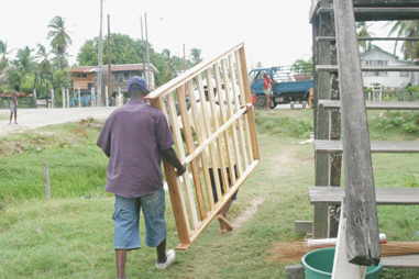 Cato's bed being taken away after the blood was washed off yesterday.