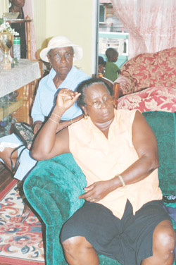  Gloria Dublin, the grieving widow with relatives.